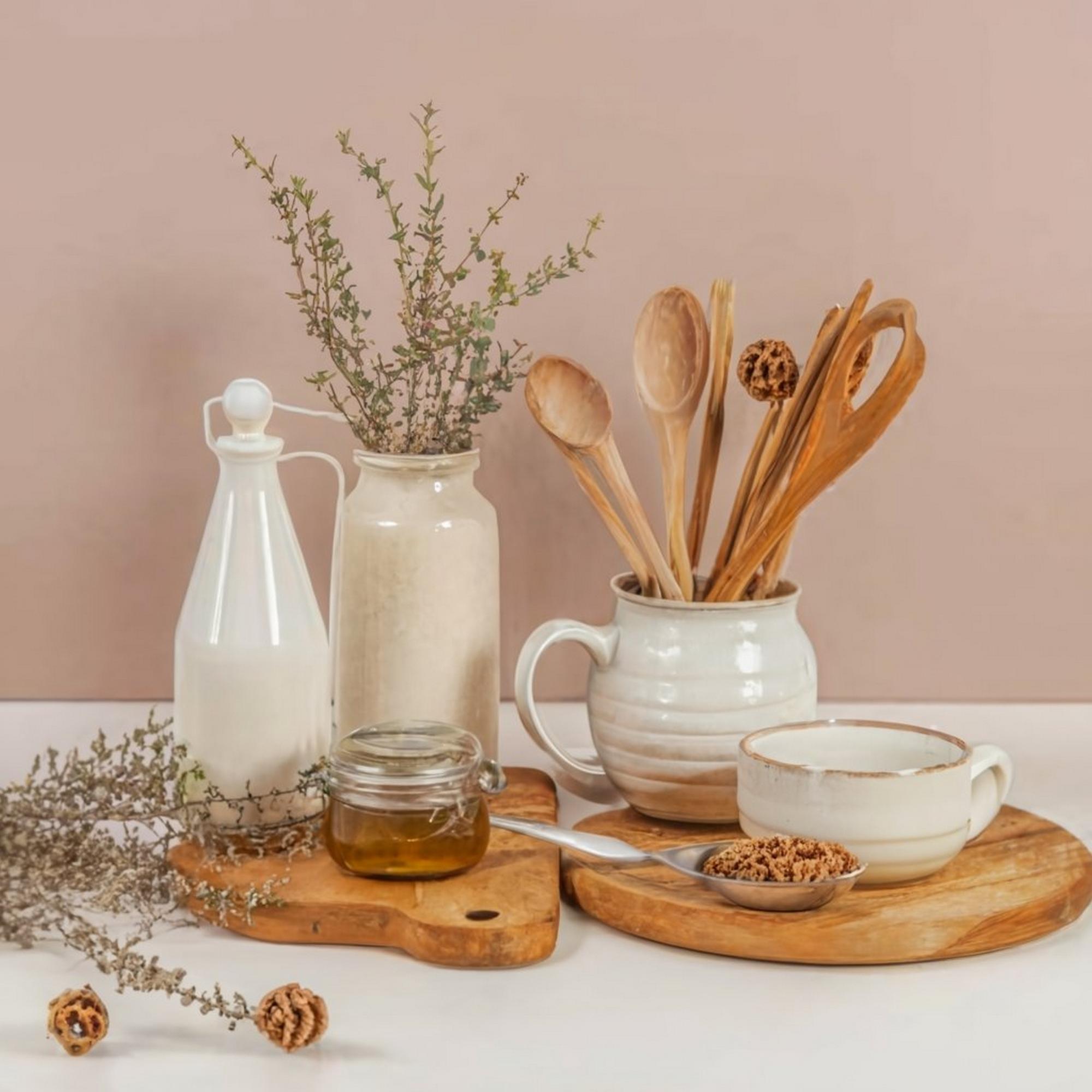 Small kitchen studio with pastel utensils
